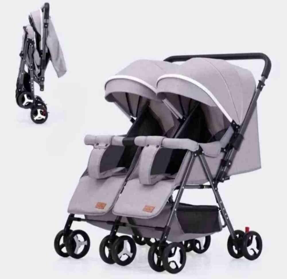 Lightweight foldable twin umbrella stroller