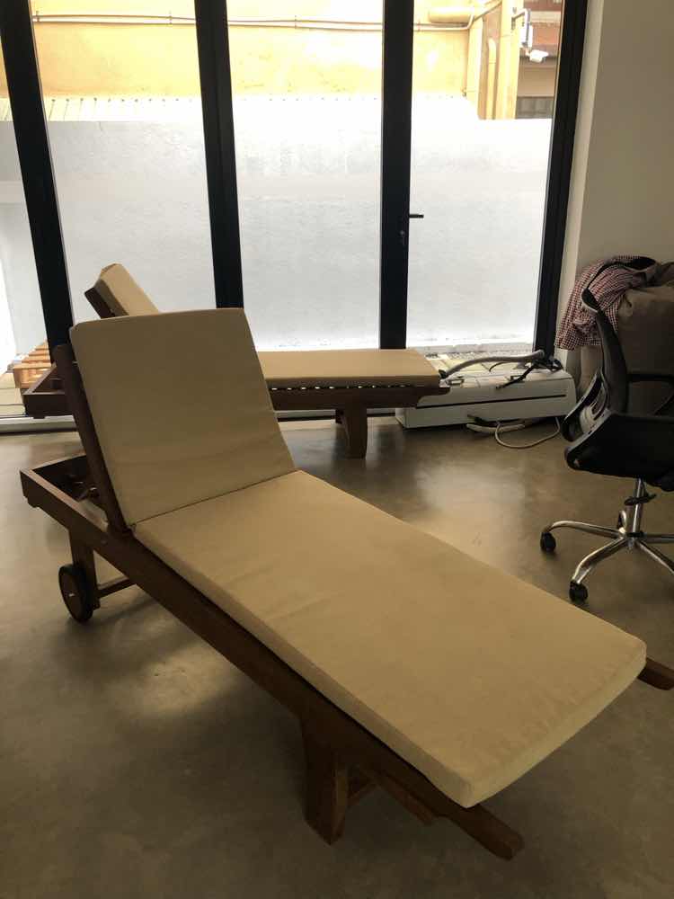 Luxury wooden sunbed with cushion