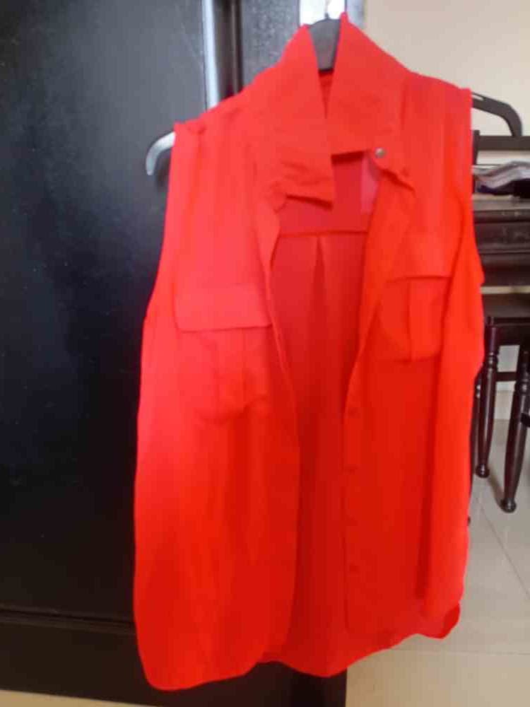 Bright red blouse