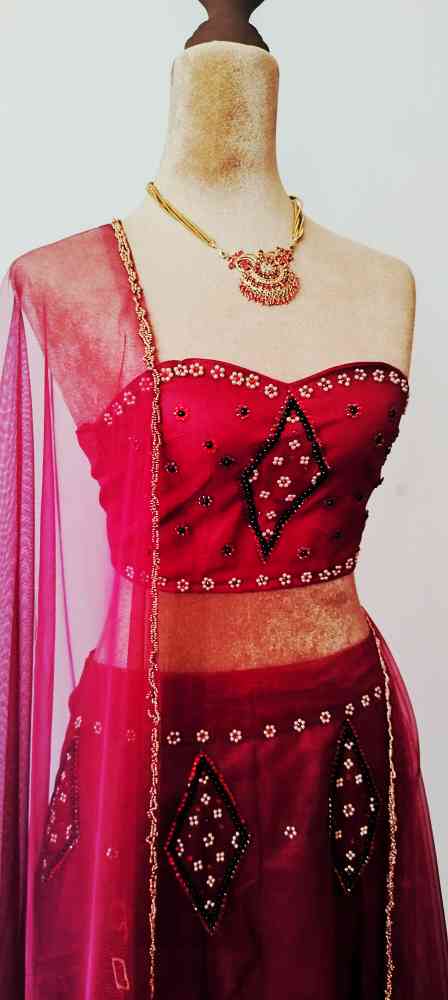 Maroon colour net lehenga