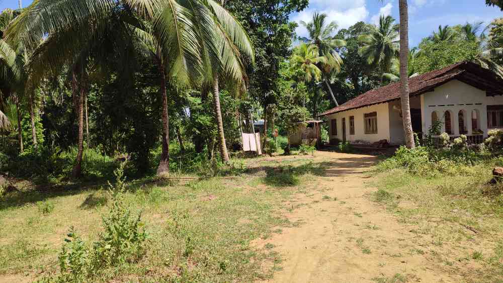 Land with house for sale