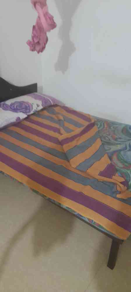 Steel bed with mattress