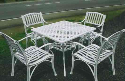 Cast steel table and chairs for sale