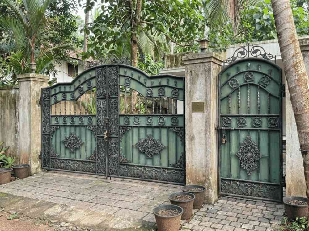 Double side main gate with pedestrian gate