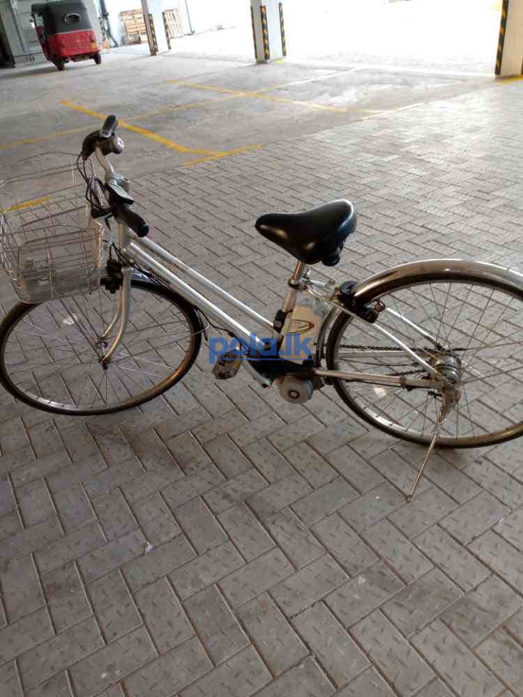 Panasonic electric bicycle with charger - photo 1