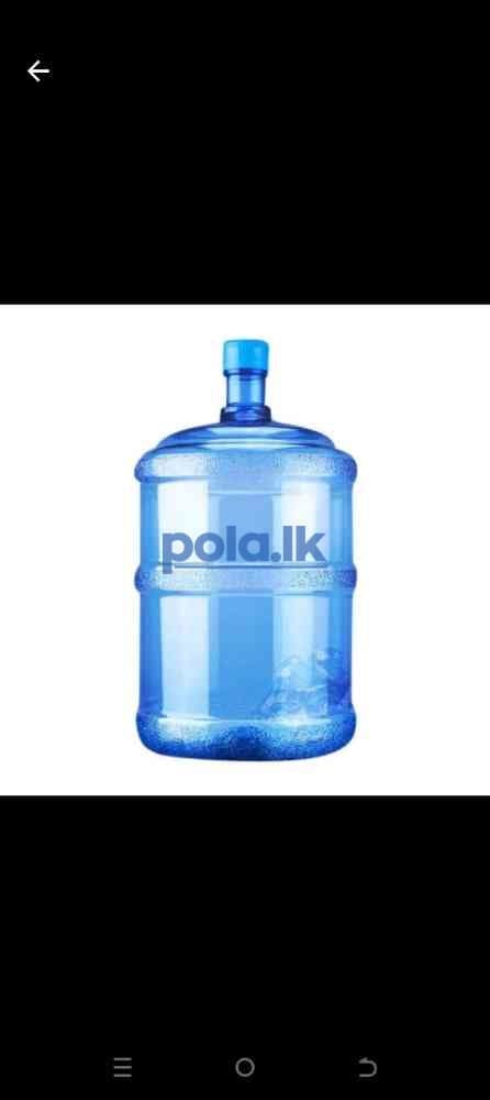 Bottled water and empty bottle - photo 3