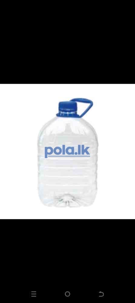 Bottled water and empty bottle - photo 5