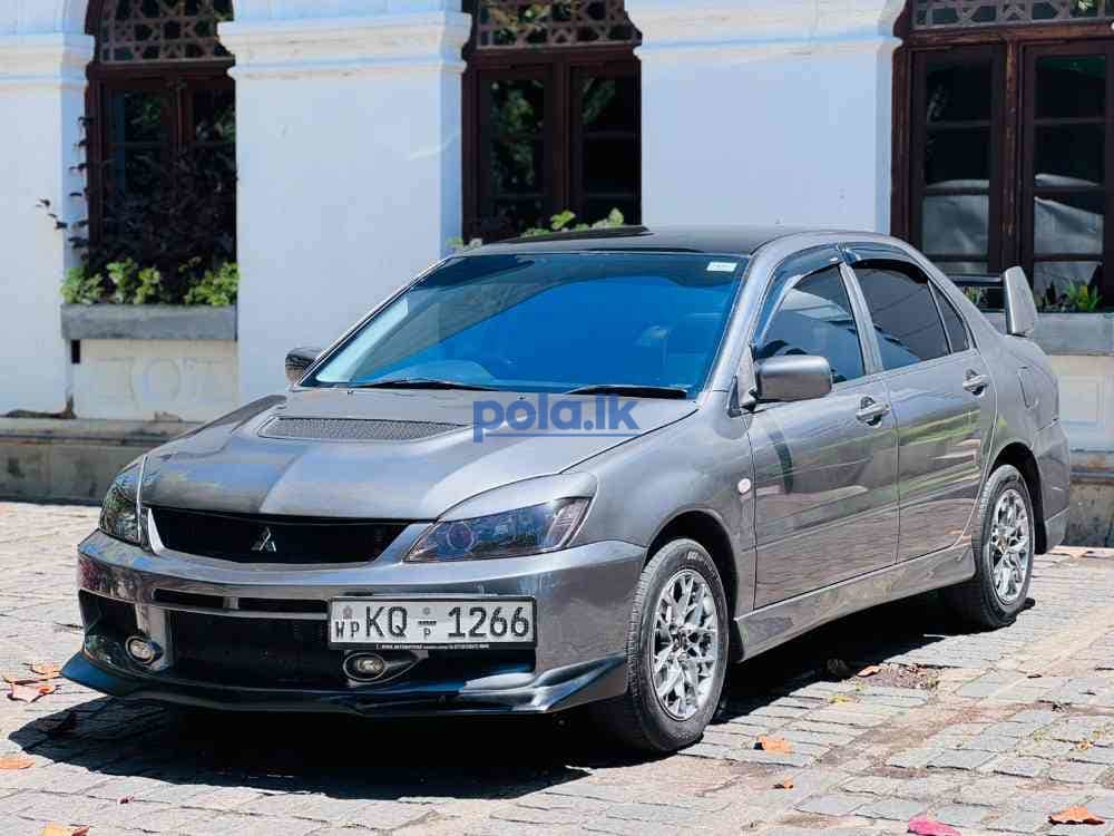 Mitsubishi lancer - photo 1