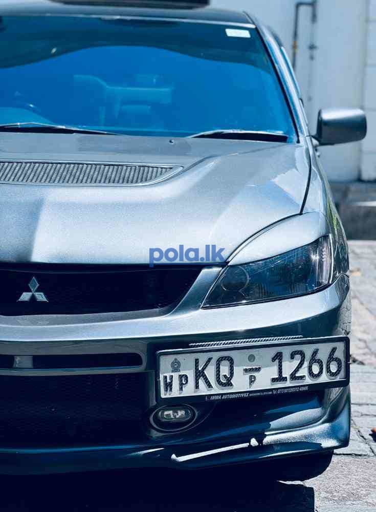 Mitsubishi lancer - photo 2