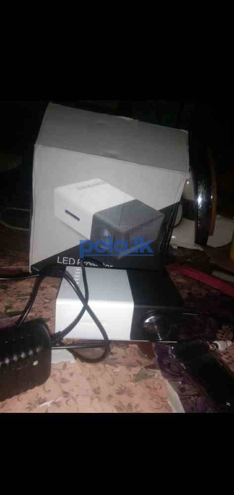 Mini projector - photo 1
