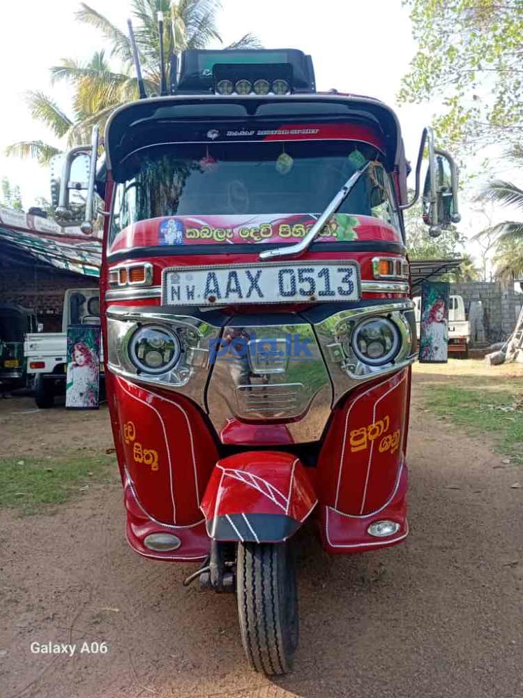 Bajaj three-wheeler - photo 1