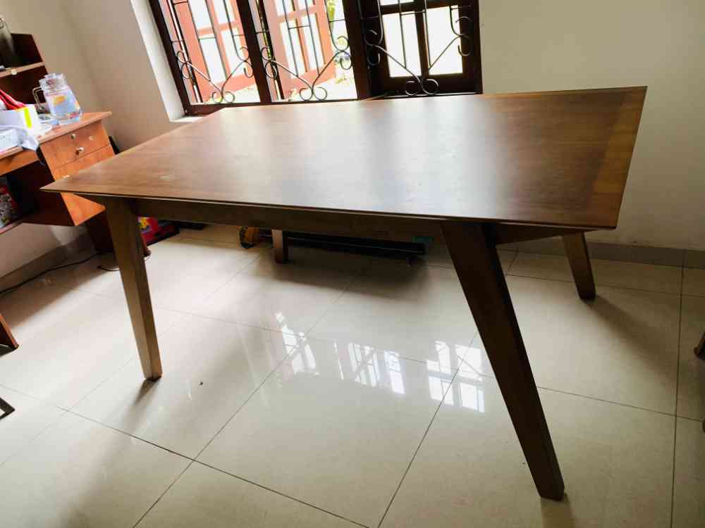 Damro teak dining table