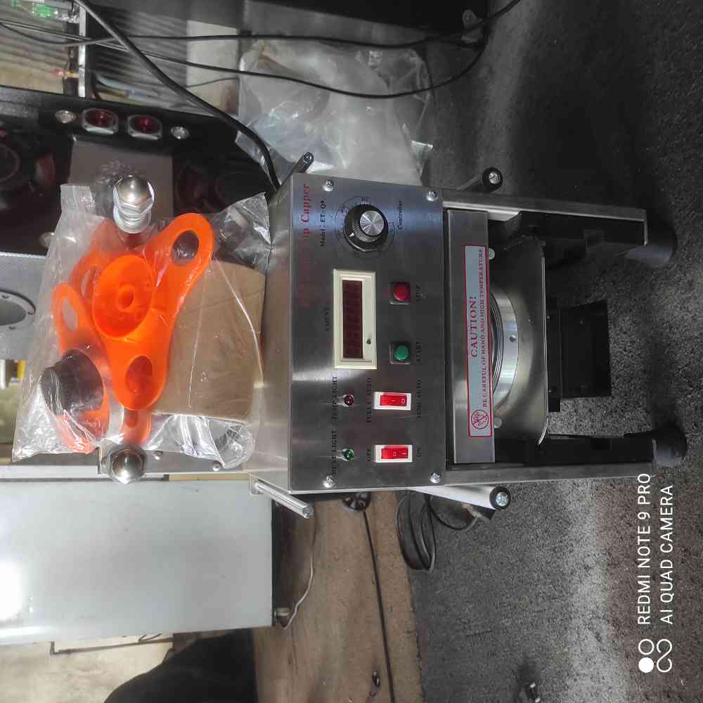 Automatic cup sealer machine