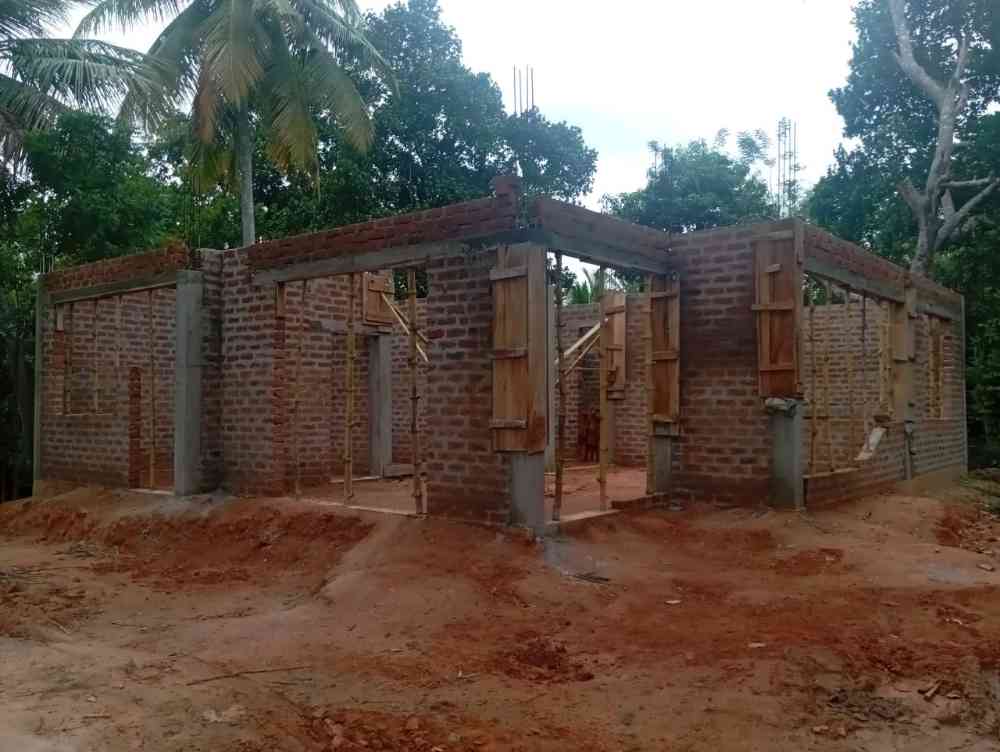 Land with half constructed house for sale