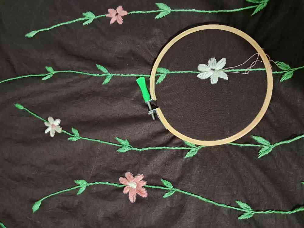 Hand embroidered cotton sarees