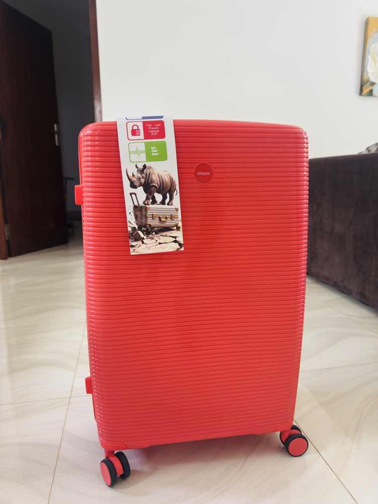 Brand new red suitcase with TSA lock